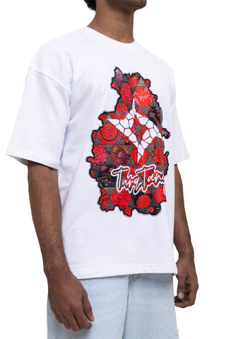 TURQTANG Floral Inferno Oversized T-Shirt in Snow White – Artistic streetwear inspired by floral energy.