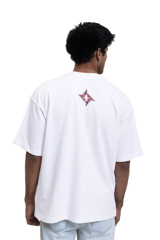 TURQTANG Floral Inferno Oversized T-Shirt in Snow White – Artistic streetwear inspired by floral energy.