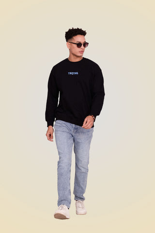 Divine Dragon Oversized Sweatshirt unisex sweatshirt in classic black color worn by male model, front full view