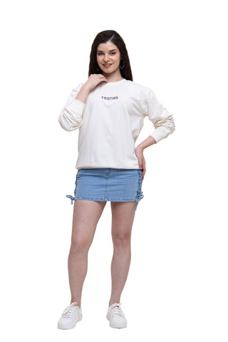 Female Wearing TURQTANG Divine Dragon Oversized Sweatshirt in Pastel Cream – premium oversized sweatshirt front view.