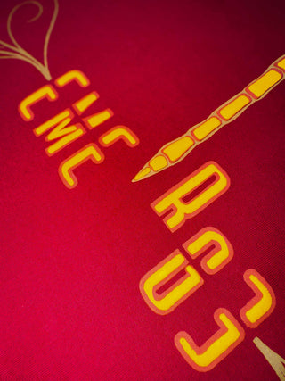 Close-up of Dragonfly graphic print detail on Dragonfly Oversized Tee-Shirt unisex T-shirt in burgundy color