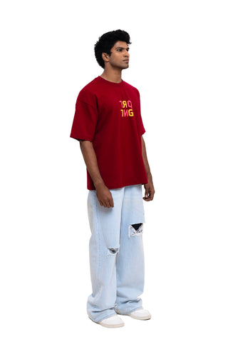 TURQTANG Dragonfly Oversized T-Shirt in Burgundy – Fashion-forward comfort with artistic detail.