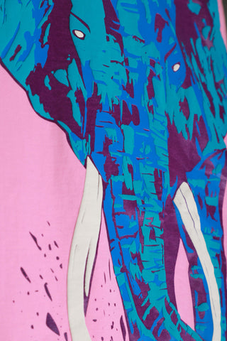 Close-up of the Elephantastic graphic print on unisex cotton candy pink oversized T-shirt