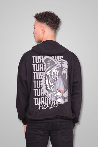 Classic black Fierce unisex oversized hoodie worn by male model, back view