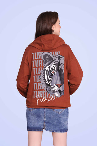 Mahogany Fierce unisex oversized hoodie worn by female model, back view