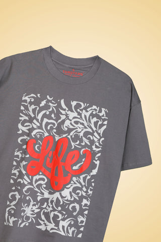 Front view showing graphic print on Life Oversized Tee-Shirt unisex T-shirt in midnight grey color