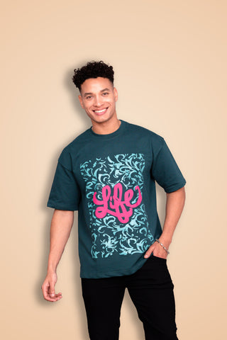 teal green Life Oversized Tee-Shirt unisex T-shirt worn by male model, front view