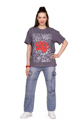Front view of the girl wearing the LIFE OVERSIZED T-SHIRT - MIDNIGHT GREY Colour