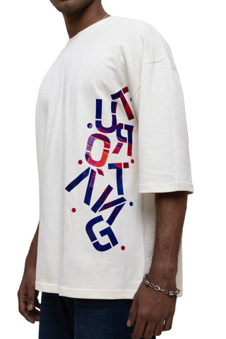 TURQTANG Stacked in Style Oversized T-Shirt in Stone Ivory – Minimalist streetwear with timeless appeal.