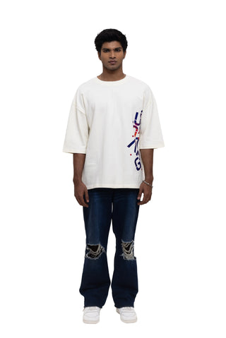 TURQTANG Stacked in Style Oversized T-Shirt in Stone Ivory – Minimalist streetwear with timeless appeal.