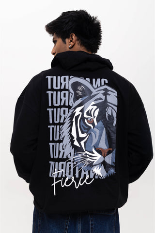TURQTANG Fierce Oversized Hoodie in Classic Black – Effortless, cozy streetwear with confident vibes.