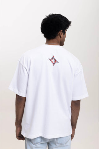 TURQTANG Floral Inferno Oversized T-Shirt in Snow White – Artistic streetwear inspired by floral energy.