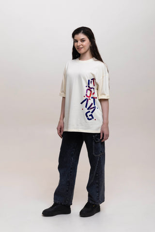 TURQTANG Stacked in Style Oversized T-Shirt in Stone Ivory – Minimalist streetwear with timeless appeal.