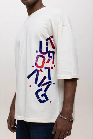 TURQTANG Stacked in Style Oversized T-Shirt in Stone Ivory – Minimalist streetwear with timeless appeal.